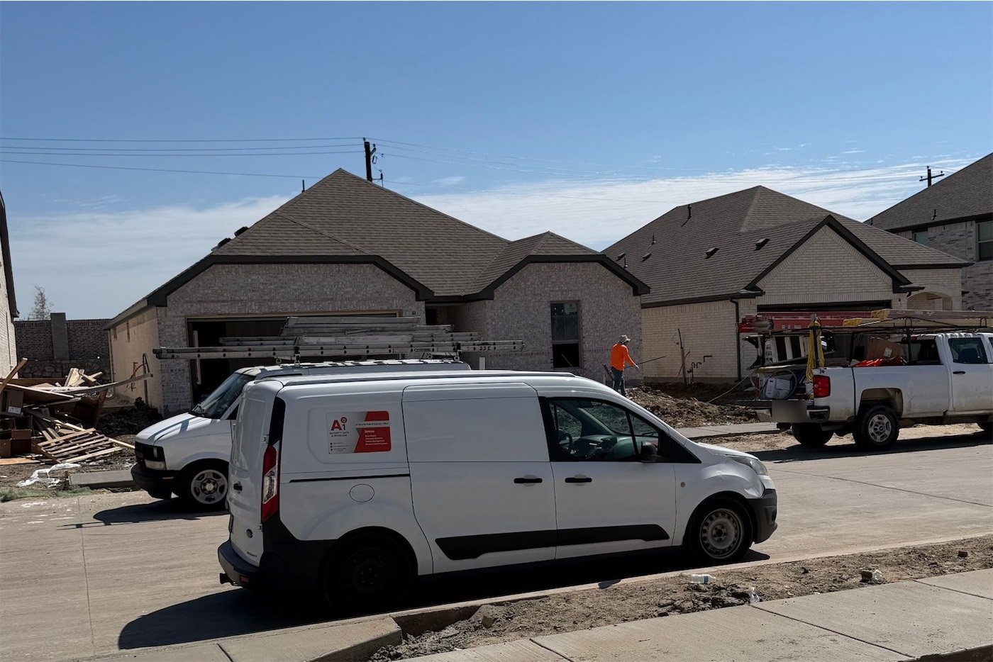A1 Security Gate & Intercom service van at a job site in Dallas–Fort Worth