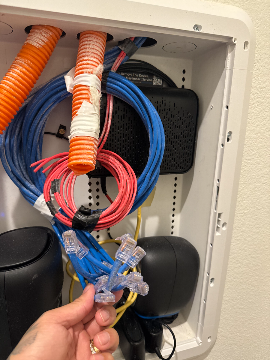 A1 Security technician installing access control wiring on a commercial door in Dallas TX