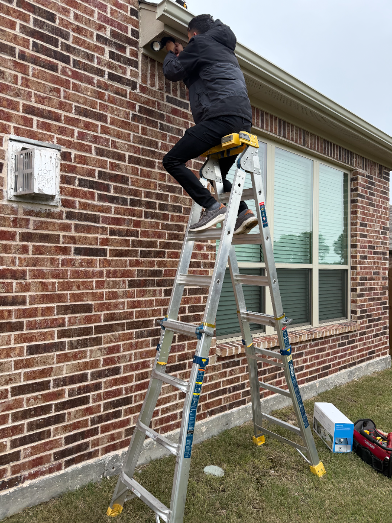 Outdoor security camera installation illustrating camera system cost in Dallas