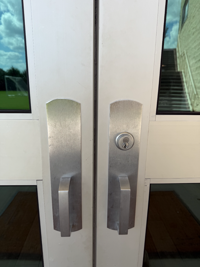 Commercial double doors with panic bars installed by A1 Security in Dallas